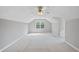Spacious bedroom features a ceiling fan, neutral walls, and a window offering natural light at 101 Conway Ct, Cary, NC 27513