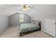 Bedroom featuring a ceiling fan and a bed with floral-patterned bedding at 101 Conway Ct, Cary, NC 27513