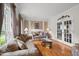 Inviting living room with hardwood floors, comfortable seating, and elegant decor at 101 Conway Ct, Cary, NC 27513
