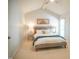 Cozy bedroom with neutral tones, vaulted ceiling, and plenty of natural light at 101 Lakeshore Dr. Dr, Durham, NC 27713