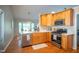 Well-equipped kitchen with stainless steel appliances, hardwood floors, and a modern design at 101 Lakeshore Dr. Dr, Durham, NC 27713