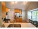 Bright kitchen features light cabinets, stainless steel appliances, and eat-in kitchen area at 101 Lakeshore Dr. Dr, Durham, NC 27713
