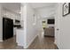 Hallway view connecting the kitchen, living room, and other areas of the home at 1021 S Fieldhaven Dr, Fuquay Varina, NC 27526