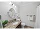 Bright bathroom with granite countertops and a vanity with storage at 104 Farnham Ct, Garner, NC 27529