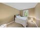 Cozy bedroom featuring natural light and neutral color scheme at 104 Farnham Ct, Garner, NC 27529