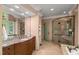 Elegant bathroom with a walk-in shower, spacious vanity, and abundant natural light at 108 Martinique Pl, Cary, NC 27511