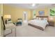 Comfortable bedroom with natural light, neutral tones, and a cozy bed with stylish decorative pillows at 108 Martinique Pl, Cary, NC 27511