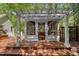 Picturesque screened-in gazebo with comfortable seating, perfect for outdoor relaxation at 108 Martinique Pl, Cary, NC 27511