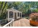 Charming screened-in gazebo and outdoor dining area enhance backyard enjoyment at 108 Martinique Pl, Cary, NC 27511