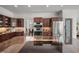 Well-equipped kitchen showcases custom cabinetry, stainless steel appliances, and center island cooktop at 108 Martinique Pl, Cary, NC 27511