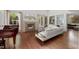 Cozy living room with a fireplace, plush seating, and large windows offering ample natural light at 108 Martinique Pl, Cary, NC 27511