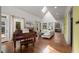 Bright, airy living room boasts a fireplace, skylight, and gleaming hardwood floors at 108 Martinique Pl, Cary, NC 27511