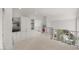 Bright loft area with custom built-ins, access to an upper balcony and views to the lower level at 108 Martinique Pl, Cary, NC 27511