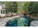 Relaxing backyard pool, gazebo, and spa, ideal for outdoor entertaining and leisurely enjoyment at 108 Martinique Pl, Cary, NC 27511