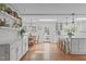 Spacious white kitchen with island, breakfast nook, and views of the backyard at 1107 Daleland Dr, Raleigh, NC 27612