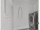 Laundry room featuring stainless steel washer/dryer at 1107 Daleland Dr, Raleigh, NC 27612