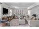 Cozy living room with neutral tones, stylish decor, and comfortable seating arrangement at 1107 Daleland Dr, Raleigh, NC 27612