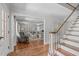 Open living room with hardwood floors, natural light, and neutral decor at 1107 Daleland Dr, Raleigh, NC 27612