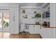 Bright office space with custom built-ins, workspace and hardwood floors at 1107 Daleland Dr, Raleigh, NC 27612