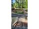 View from the porch looking at the circular driveway and landscaped front yard at 113 Colonial Dr, Wendell, NC 27591