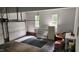 Spacious garage with white walls, multiple windows, and ample storage space at 113 Colonial Dr, Wendell, NC 27591