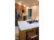 This kitchen features stainless steel appliances, a double sink, and a breakfast bar with chairs at 113 Colonial Dr, Wendell, NC 27591