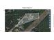 Aerial view of property with bordering street, 419, 470, 748 and 151 feet lot size and surrounded by trees at 113 Pineview Dr, Louisburg, NC 27549