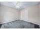 Bedroom featuring carpeting, a ceiling fan, and a closet at 123 Alan Ln, Clayton, NC 27520