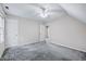 Bedroom featuring carpeting, a ceiling fan, and two doors at 123 Alan Ln, Clayton, NC 27520