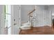 Bright foyer featuring hardwood floors and staircase at 1245 Torchlight Way, Raleigh, NC 27603