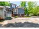 Backyard with a detached garage and small garden beds along the side of the house at 130 N Bloodworth St, Raleigh, NC 27601