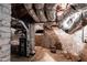 Basement with exposed brick wall and exposed HVAC system offering a glimpse into the home's infrastructure at 130 N Bloodworth St, Raleigh, NC 27601