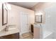 Bathroom featuring double sinks and a walk-in shower at 130 N Bloodworth St, Raleigh, NC 27601