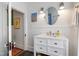Bathroom with a vanity and mirror at 130 N Bloodworth St, Raleigh, NC 27601