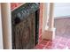 A vintage-style fireplace insert adds character to the room, surrounded by decorative tile and architectural detail at 130 N Bloodworth St, Raleigh, NC 27601