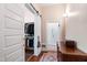 Hallway with a walk-in closet and a view into the bathroom at 130 N Bloodworth St, Raleigh, NC 27601