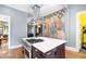 Gourmet kitchen featuring a spacious island, chef-grade range, and bright, open layout at 130 N Bloodworth St, Raleigh, NC 27601