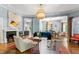Living room with hardwood floors, stylish decor, and an open layout at 130 N Bloodworth St, Raleigh, NC 27601
