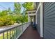 Long covered porch with room for outdoor seating and a view of the neighborhood at 130 N Bloodworth St, Raleigh, NC 27601