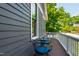 Relaxing wrought iron seating with a cup of coffee on a cozy covered porch at 130 N Bloodworth St, Raleigh, NC 27601