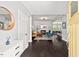 Bright and spacious foyer with hardwood floors leading to the living room and kitchen at 1427 Bungalow Ave, Durham, NC 27703