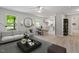 Inviting space offering living, dining, kitchen and bath with warm light from the modern fixtures at 1513 Fairfax Rd, Durham, NC 27701