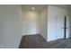 Neutral carpeted bedroom with light walls, trim, and a double door closet at 152 Bruce Dr, Dunn, NC 28334