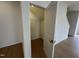 View of a walk-in closet with wire shelving and neutral carpeting at 152 Bruce Dr, Dunn, NC 28334