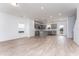 Spacious kitchen with gray cabinets, stainless steel appliances, a center island, and hardwood floors at 152 Bruce Drive Dr, Dunn, NC 28334