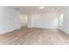 Bright, open living space with hardwood floors, neutral walls, and a modern design at 152 Bruce Drive Dr, Dunn, NC 28334