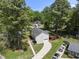 Charming single Gathering home featuring a long driveway, an attached garage, and a rear deck at 1532 Cone Ave, Apex, NC 27502