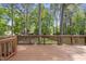 Wooden deck overlooking a lush yard, perfect for outdoor gatherings and enjoying the natural surroundings at 1532 Cone Ave, Apex, NC 27502