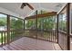 Relaxing screened porch offers views of lush greenery and provides a tranquil outdoor space at 1532 Cone Ave, Apex, NC 27502