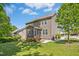 This is a lush backyard with a screened porch, creating an inviting outdoor space for gatherings and relaxation at 1557 Tice Hurst Ln, Apex, NC 27502